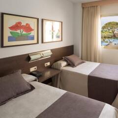 Aqua Hotel Montagut Suites комната для гостей фото 4