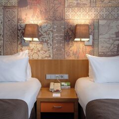 Гостиница Holiday Inn Moscow Tagansky (бывший Симоновский) в Москве - забронировать гостиницу Holiday Inn Moscow Tagansky (бывший Симоновский), цены и фото номеров Москва комната для гостей фото 12