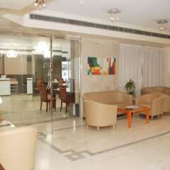 Отель Al Buhairah Hotel Apartments ОАЭ, Шарджа - отзывы, цены и фото номеров - забронировать отель Al Buhairah Hotel Apartments онлайн интерьер отеля