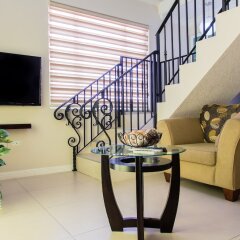 Отель Eight 24 by Pro Homes Jamaica Ямайка, Кингстон - отзывы, цены и фото номеров - забронировать отель Eight 24 by Pro Homes Jamaica онлайн интерьер отеля