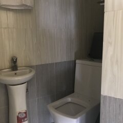 Отель Pentagon Luxury Suites Enugu Нигерия, Энугу - отзывы, цены и фото номеров - забронировать отель Pentagon Luxury Suites Enugu онлайн ванная фото 2