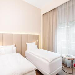 Отель NH Collection Berlin Mitte Friedrichstrasse 4* Стандартный номер с различными типами кроватей фото 5