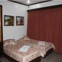 Отель Cebu Residencia Lourdes Филиппины, Лапу-Лапу - отзывы, цены и фото номеров - забронировать отель Cebu Residencia Lourdes онлайн комната для гостей