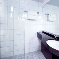 Отель Clarion Collection Hotel Aurora Норвегия, Тромсе - отзывы, цены и фото номеров - забронировать отель Clarion Collection Hotel Aurora онлайн ванная фото 2