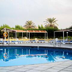 Отель Golden Beach Motel ОАЭ, Шарджа - 1 отзыв об отеле, цены и фото номеров - забронировать отель Golden Beach Motel онлайн бассейн фото 3