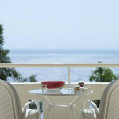 Отель Mitsis Family Village Beach Hotel Греция, Калимнос - отзывы, цены и фото номеров - забронировать отель Mitsis Family Village Beach Hotel онлайн балкон