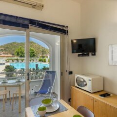 Отель Hibiscus Hotel Residence Италия, Синискола - отзывы, цены и фото номеров - забронировать отель Hibiscus Hotel Residence онлайн сейф в номере