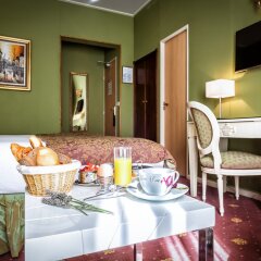 Отель Le Regence Париж в номере фото 2
