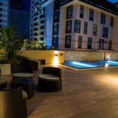 Отель Patio Luxury Suites