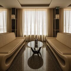 iu Hotel Sumbe комната для гостей