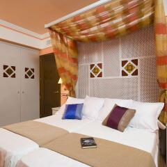 Отель Suites Gran Via 44 Apartahotel комната для гостей