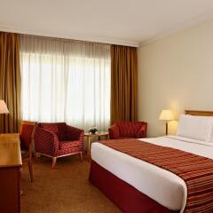 Отель Swiss-Belhotel Sharjah комната для гостей фото 4