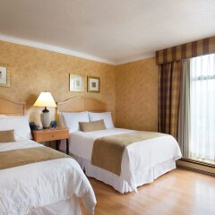 Отель Sunset Inn and Suites Канада, Ванкувер - отзывы, цены и фото номеров - забронировать отель Sunset Inn and Suites онлайн комната для гостей фото 3