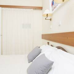 Отель Holiday Beach Resort сейф в номере