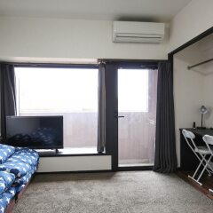 Апартаменты Sumiyoshi apartment Хаката комната для гостей фото 3