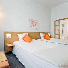 Отель Novotel Vilnius Centre Литва, Вильнюс - 11 отзывов об отеле, цены и фото номеров - забронировать отель Novotel Vilnius Centre онлайн комната для гостей фото 3