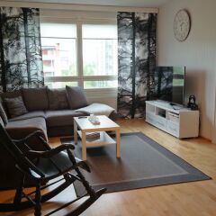 Апартаменты Local Nordic Apartments - Swan Ювяскюля комната для гостей фото 4
