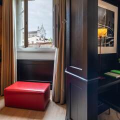 Отель Relais Santa Croce сейф в номере