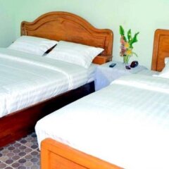 Hotel CF Lashio - Burmese Only комната для гостей