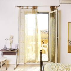 Отель Bed and Breakfast Mille e Una Notte Агридженто комната для гостей