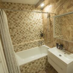 Апартаменты Flatsis Apartment Svobody 12 Харьков ванная