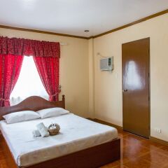 Отель La Gracia Apartelle Tagaytay Филиппины, Тагайтай - отзывы, цены и фото номеров - забронировать отель La Gracia Apartelle Tagaytay онлайн комната для гостей