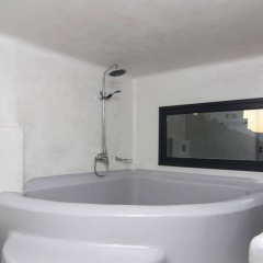 Отель Ambassador Santorini Luxury Villas & Suites ванная