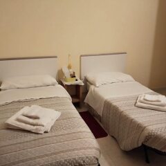 Отель Isola Verde Guest House Италия, Фьюмичино - отзывы, цены и фото номеров - забронировать отель Isola Verde Guest House онлайн комната для гостей