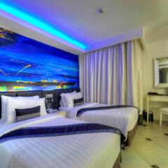 Отель Aspira Skyy Sukhumvit 1 Бангкок комната для гостей фото 2