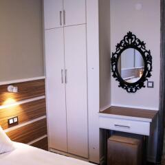 Отель Pirlanta Butik Otel Чешме сейф в номере