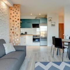 Апартаменты Downtown Apartments - Nowa Motlawa комната для гостей фото 7