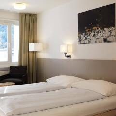 Отель Serviced Apartments by Solaria Швейцария, Давос - 1 отзыв об отеле, цены и фото номеров - забронировать отель Serviced Apartments by Solaria онлайн комната для гостей фото 2