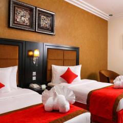 Отель Royal Grand Suite Шарджа комната для гостей фото 2