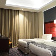 Ramee Guestline Hotel Qurum in Muscat, Oman from 68$, photos, reviews - zenhotels.com guestroom photo 3