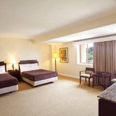 Отель Holiday Resort And Spa Тамунинг комната для гостей фото 4