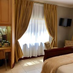 Отель J's Guesthouse удобства в номере
