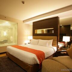 Отель Legacy Suites Sukhumvit by Compass Hospitality Таиланд, Бангкок - 2 отзыва об отеле, цены и фото номеров - забронировать отель Legacy Suites Sukhumvit by Compass Hospitality онлайн комната для гостей фото 3