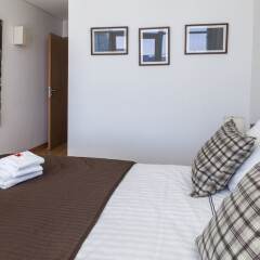 Апартаменты Rent4Rest Lisbon 17th Floor River View Apartment комната для гостей фото 2