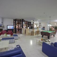 Апартаменты Latania Apartments гостиничный бар