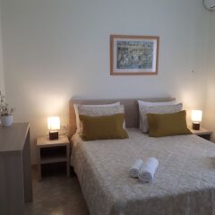 Апартаменты Sunset Relax Apartments комната для гостей