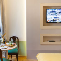 Отель Grand Master Suites в номере