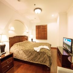 Апартаменты Baan Montida Serviced Apartment Бангкок комната для гостей фото 3