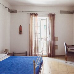 Отель Otium Home Rentals Италия, Сиракуза - отзывы, цены и фото номеров - забронировать отель Otium Home Rentals онлайн комната для гостей фото 5