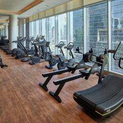 Отель Waldorf Astoria Dubai International Financial Centre ОАЭ, Дубай - отзывы, цены и фото номеров - забронировать отель Waldorf Astoria Dubai International Financial Centre онлайн фитнесс-зал