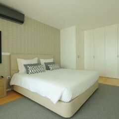 Апартаменты Deluxe Populo Beach Apartments комната для гостей фото 3