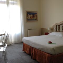 Отель Albergo Minerva Церковь Св. Маргариты Лигурийской комната для гостей