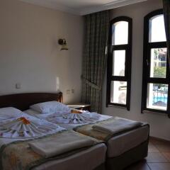 Апартаменты Club Turquoise Apartments комната для гостей фото 5