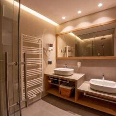 Отель Familien-Wellness Residence Tyrol Натурно ванная
