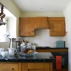 Отель Waterside Cottage в номере