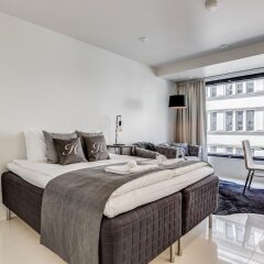 Апартаменты Kotimaailma Apartments Albertinkatu 27B комната для гостей фото 3